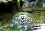 The filtered clear water is returned to the pool through nozzles/small waterfalls.