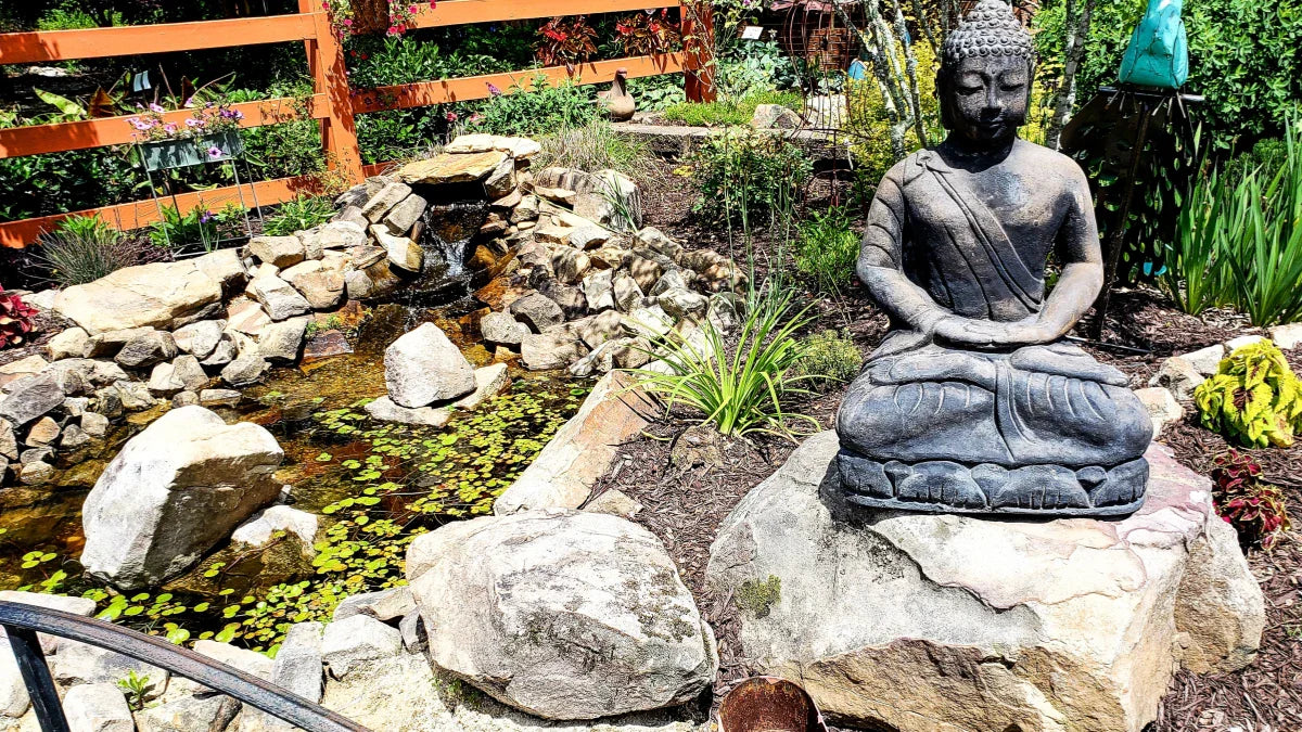 a Zen Garden With a Pond Fountain