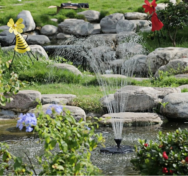 Backyard water feature with solar fountain